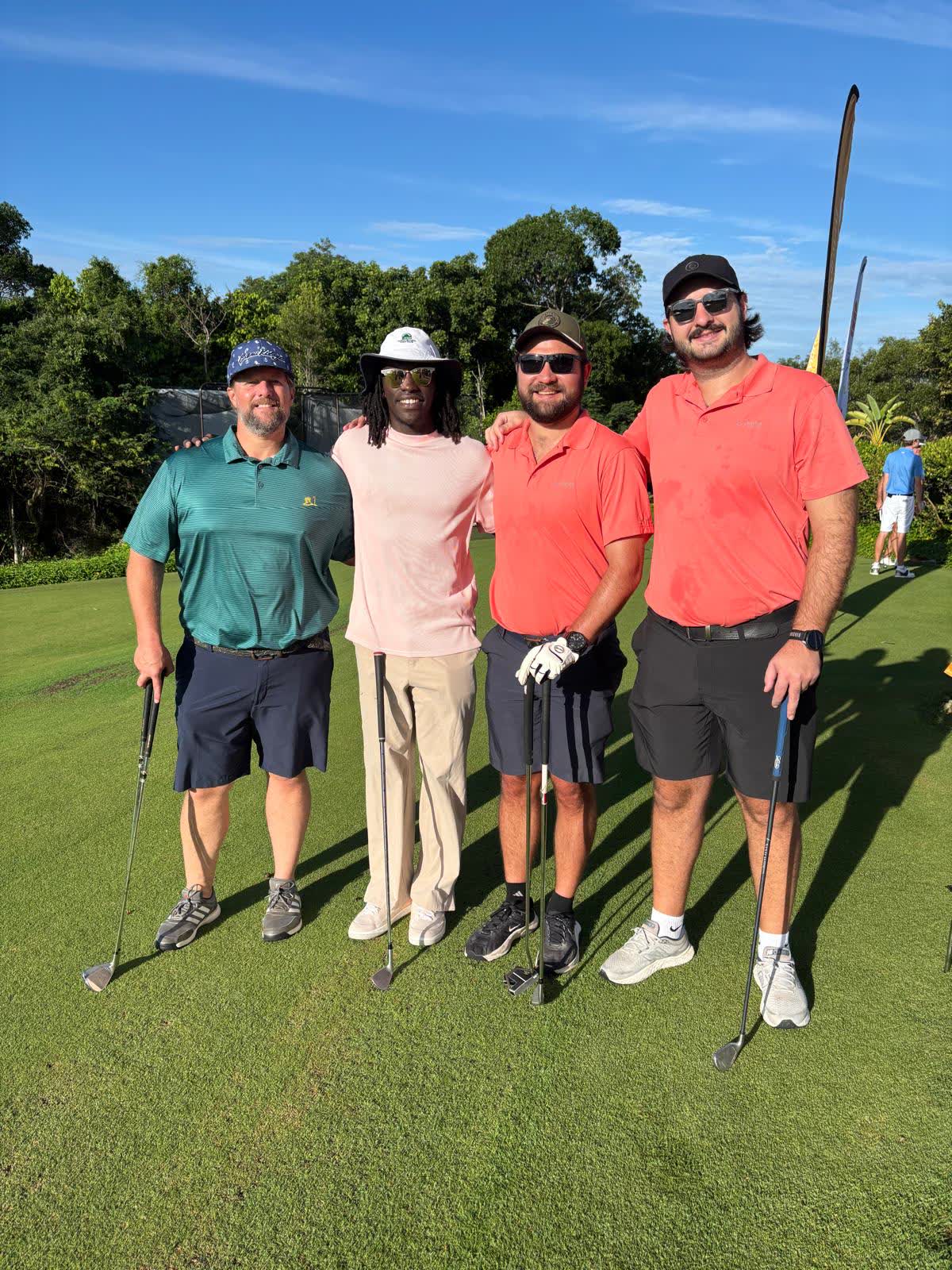 The Sagoma team of four golfers on the course at The Poop Deck Eagles Charity Golf Tournament