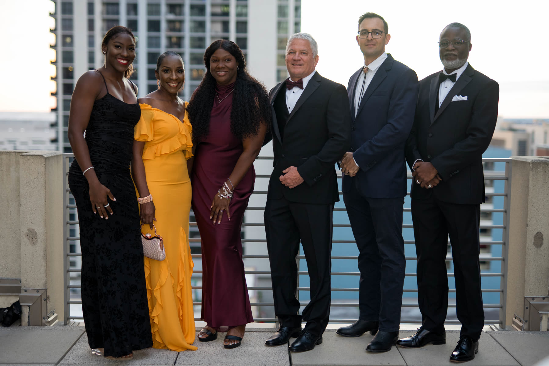 The Sagoma team, including Marvin Arrington, Theuns Vogel and Stephen Greenslade, on the rooftop at The Village Initiative inaugural gala